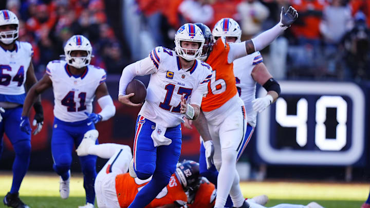 Jan 17, 2026; Denver, CO, USA; Buffalo Bills quarterback Josh Allen (17) runs during the second quarter of an AFC Divisional Round playoff game against the Denver Broncos at Empower Field at Mile High.