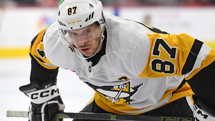 Feb 25, 2025; Philadelphia, Pennsylvania, USA; Pittsburgh Penguins center Sidney Crosby (87) prepare for a face-off against the Philadelphia Flyers during the first period at Wells Fargo Center. Mandatory Credit: Eric Hartline-Imagn Images