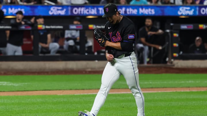 Aug 29, 2025; New York City, New York, USA; New York Mets starting pitcher Jonah Tong (21) reacts after striking out Miami Marlins catcher Liam Hicks (not pictured) to end the top of the fifth inning at Citi Field. Mandatory Credit: Vincent Carchietta-Imagn Images Aug 29, 2025; New York City, New York, USA; New York Mets starting pitcher Jonah Tong (21) reacts after striking out Miami Marlins catcher Liam Hicks (not pictured) to end the top of the fifth inning at Citi Field. Mandatory Credit: Vincent Carchietta-Imagn Images