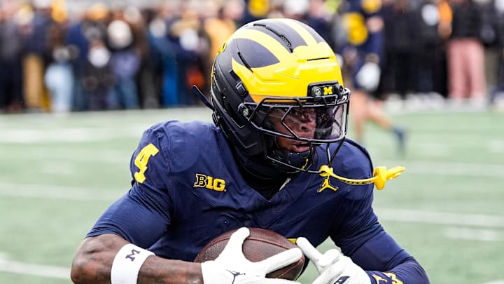 Michigan wide receiver Andrew Marsh (4) warms up at Michigan Stadium in Ann Arbor on Saturday, Nov. 29, 2025.