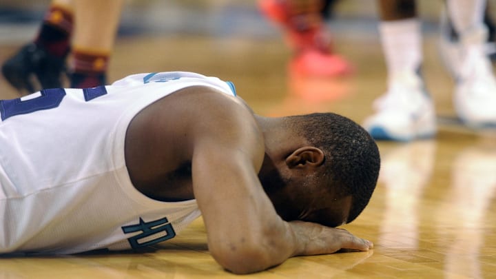 Apr 29, 2016; Charlotte, NC, USA; Charlotte Hornets guard Kemba Walker (15) reacts