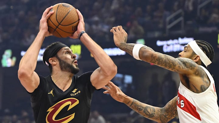 Oct 31, 2025; Cleveland, Ohio, USA; Cleveland Cavaliers forward Larry Nance Jr. (22) looks to shoot beside Toronto Raptors forward Brandon Ingram (3) in the first quarter at Rocket Arena. Mandatory Credit: David Richard-Imagn Images