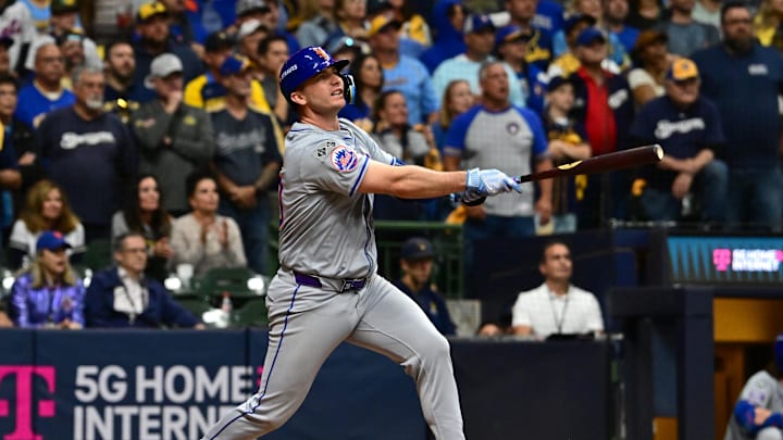 Oct 3, 2024; Milwaukee, Wisconsin, USA; New York Mets first baseman Pete Alonso (20) hits a three run home run against the Milwaukee Brewers in the ninth inning during game three of the Wildcard round for the 2024 MLB Playoffs at American Family Field. Mandatory Credit: Benny Sieu-Imagn Images