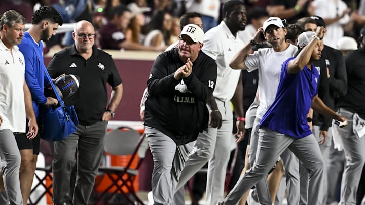 Oct 11, 2025; College Station, Texas, USA; Texas A&M Aggies head coach Mike Elko reacts after the win over the Florida Gators at Kyle Field. Mandatory Credit: Maria Lysaker-Imagn Images  Oct 11, 2025; College Station, Texas, USA; Texas A&M Aggies head coach Mike Elko reacts after the win over the Florida Gators at Kyle Field. Mandatory Credit: Maria Lysaker-Imagn Images