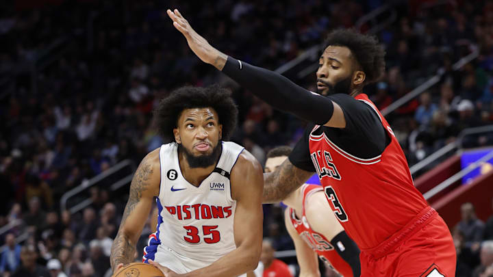 Mar 1, 2023; Detroit, Michigan, USA;  Detroit Pistons forward Marvin Bagley III (35) is defended by Chicago Bulls center Andre Drummond (3) in the first half at Little Caesars Arena. Mandatory Credit: Rick Osentoski-Imagn Images