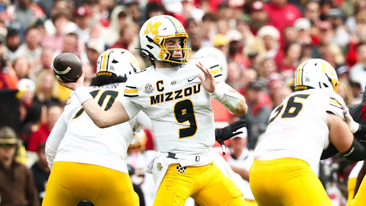 Nov 22, 2025; Norman, Oklahoma, USA; Missouri Tigers quarterback Beau Pribula (9) throws during the game against the Oklahoma Sooners at Gaylord Family-Oklahoma Memorial Stadium. Mandatory Credit: Kevin Jairaj-Imagn Images Nov 22, 2025; Norman, Oklahoma, USA; Missouri Tigers quarterback Beau Pribula (9) throws during the game against the Oklahoma Sooners at Gaylord Family-Oklahoma Memorial Stadium. Mandatory Credit: Kevin Jairaj-Imagn Images