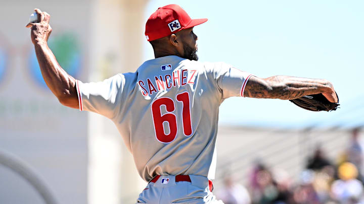 Mar 18, 2025; Bradenton, Florida, USA; Philadelphia Phillies starting pitcher Christopher Sanchez (61) throws a pitch in the first inning against the Pittsburgh Pirates during spring training at LECOM Park. 