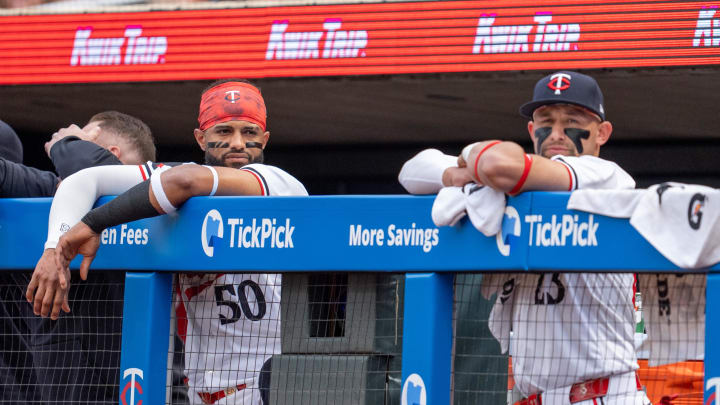 Jul 2, 2024; Minneapolis, Minnesota, USA; Minnesota Twins left fielder Willi Castro (50) and third base Royce Lewis (23) watch play from the dugout in the fifth inning against the Detroit Tigers at Target Field. Mandatory Credit: Matt Blewett-USA TODAY Sports