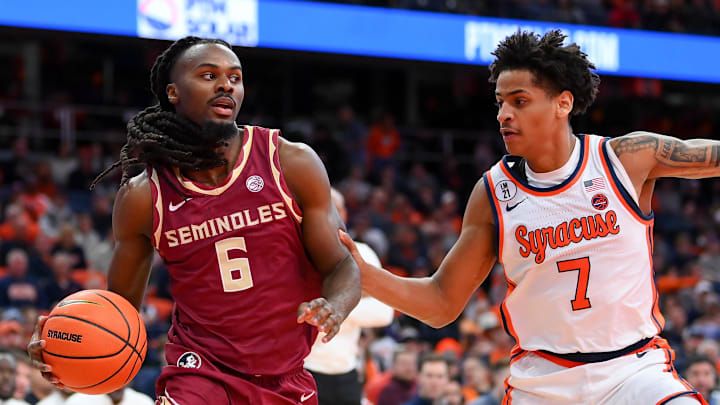 Jan 13, 2026; Syracuse, New York, USA; Florida State Seminoles guard Robert McCray V. (6) drives against Syracuse Orange guard Kiyan Anthony (7) during the first half at the JMA Wireless Dome. Mandatory Credit: Rich Barnes-Imagn Images Jan 13, 2026; Syracuse, New York, USA; Florida State Seminoles guard Robert McCray V. (6) drives against Syracuse Orange guard Kiyan Anthony (7) during the first half at the JMA Wireless Dome. Mandatory Credit: Rich Barnes-Imagn Images