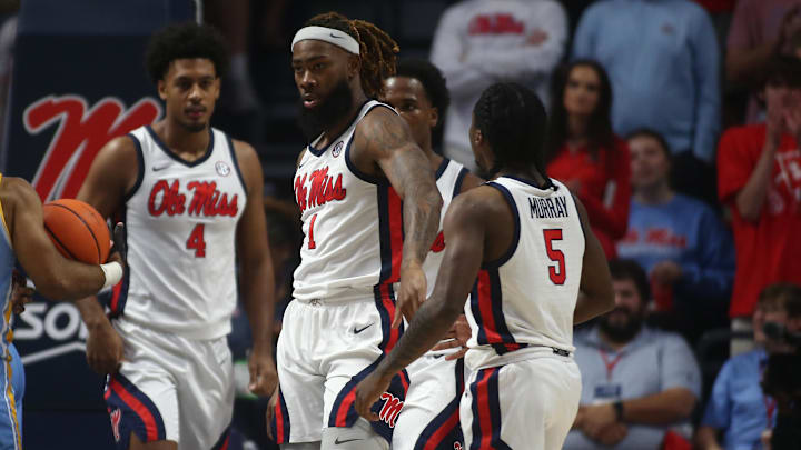 Nov 4, 2024; Oxford, Mississippi, USA; Mississippi Rebels forward Mikeal Brown-Jones (1) reacts with guard Jaylen Murray (5) during the first half against the Long Island Sharks at The Sandy and John Black Pavilion at Ole Miss. Mandatory Credit: Petre Thomas-Imagn Images