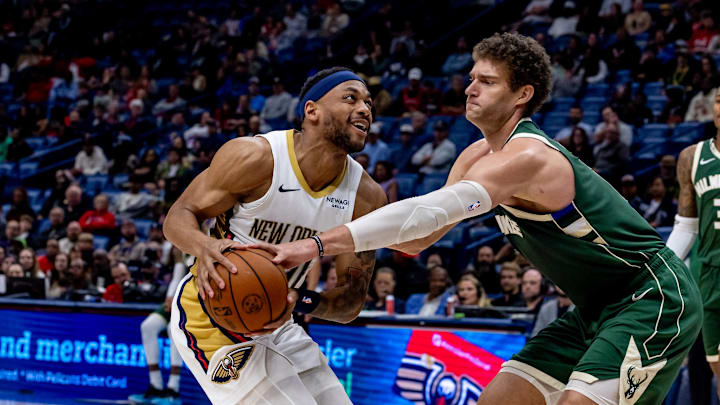 New Orleans Pelicans forward Bruce Brown has the ball knocked loose by Milwaukee Bucks center Brook Lopez. Mandatory Credit: Stephen Lew-Imagn Images New Orleans Pelicans forward Bruce Brown has the ball knocked loose by Milwaukee Bucks center Brook Lopez. Mandatory Credit: Stephen Lew-Imagn Images