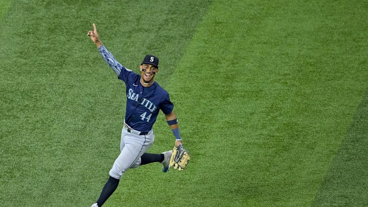 Seattle Mariners center fielder Julio Rodriguez (44) celebrates after Seattle Mariners left fielder Randy Arozarena (not pictured) makes a sliding catch on a fly ball hit by Texas Rangers shortstop Josh Smith (not pictured) during the first inning at Globe Life Field on Sept 22.