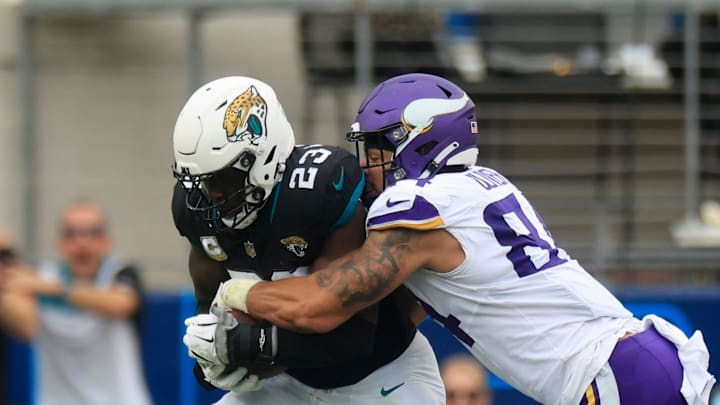 Jacksonville Jaguars linebacker Foyesade Oluokun (23) collects a tipped ball for an interception during the first quarter an NFL football matchup Sunday, Nov. 10, 2024 at Everbank Stadium in Jacksonville, Fla. [Corey Perrine/Florida Times-Union]