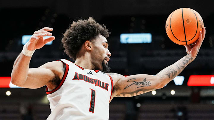 Louisville Cardinals guard J'Vonne Hadley (1) grabs a rebound during the Cards' 104-45 win over South Carolina State at the KFC Yum! Center in Louisville, Kentucky Monday night, Nov. 3, 2025.