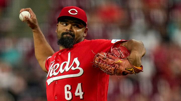 Cincinnati Reds pitcher Tony Santillan (64) throws a pitch in the 10th inning of the MLB National League Central game between the Cincinnati Reds and the Milwaukee Brewers at Great American Ball Park in downtown Cincinnati on Monday, June 22, 2026. The Brewers won, 2-1, in 10 innings. Cincinnati Reds pitcher Tony Santillan (64) throws a pitch in the 10th inning of the MLB National League Central game between the Cincinnati Reds and the Milwaukee Brewers at Great American Ball Park in downtown Cincinnati on Monday, June 22, 2026. The Brewers won, 2-1, in 10 innings.