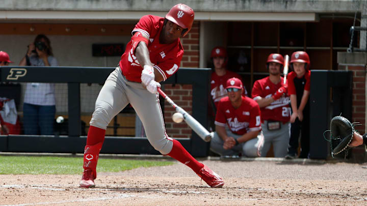 Indiana Hoosiers infielder Devin Taylor (5) swings at the ball during the NCAA baseball game against the Purdue Boilermakers, Sunday, May 5, 2024, at Alexander Field in West Lafayette, Ind.