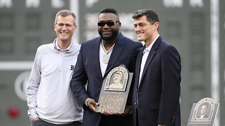 May 27, 2022; Boston, Massachusetts, USA; Boston Red Sox president Sam Kennedy and chief baseball officer Chaim Bloom honor former player David Ortiz into the Red Sox Hall of Fame prior to a game against the Baltimore Orioles at Fenway Park. Mandatory Credit: Bob DeChiara-Imagn Images