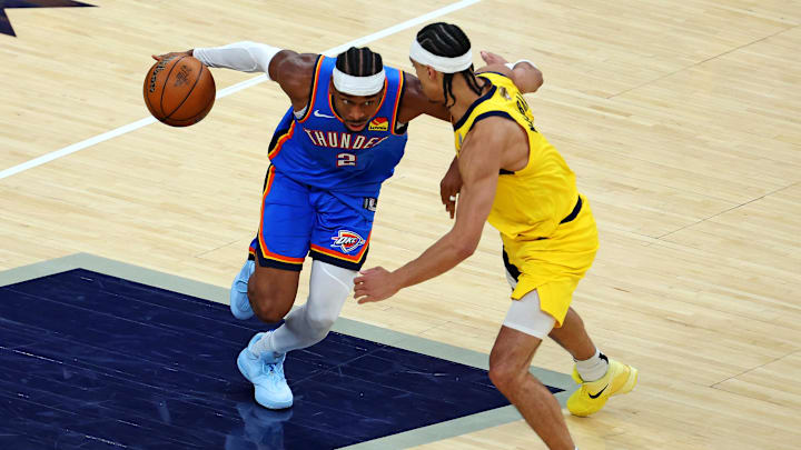 Jun 11, 2025; Indianapolis, Indiana, USA; Oklahoma City Thunder guard Shai Gilgeous-Alexander (2) drives to the basket against Indiana Pacers guard Andrew Nembhard (2) during the fourth quarter in game three of the 2025 NBA Finals at Gainbridge Fieldhouse. Mandatory Credit: Trevor Ruszkowski-Imagn Images
