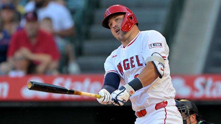 Jul 24, 2025; Anaheim, California, USA; Los Angeles Angels right fielder Mike Trout (27) singles in the first inning against the Seattle Mariners at Angel Stadium. Mandatory Credit: Jayne Kamin-Oncea-Imagn Images Jul 24, 2025; Anaheim, California, USA; Los Angeles Angels right fielder Mike Trout (27) singles in the first inning against the Seattle Mariners at Angel Stadium. Mandatory Credit: Jayne Kamin-Oncea-Imagn Images