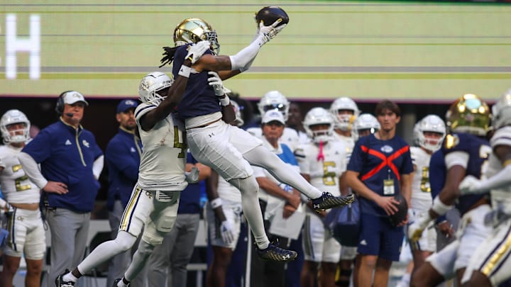 Oct 19, 2024; Atlanta, Georgia, USA; Notre Dame Fighting Irish safety Xavier Watts (0) intercepts a pass in front of Georgia Tech Yellow Jackets wide receiver Abdul Janneh Jr. (4) in the fourth quarter at Mercedes-Benz Stadium. Mandatory Credit: Brett Davis-Imagn Images
Oct 19, 2024; Atlanta, Georgia, USA; Notre Dame Fighting Irish safety Xavier Watts (0) intercepts a pass in front of Georgia Tech Yellow Jackets wide receiver Abdul Janneh Jr. (4) in the fourth quarter at Mercedes-Benz Stadium. Mandatory Credit: Brett Davis-Imagn Images