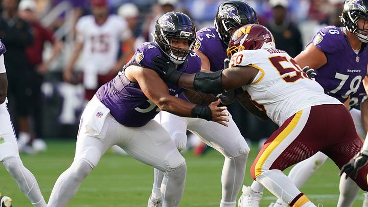 Aug 28, 2026; Baltimore, Maryland, USA; Baltimore Ravens center Jovaughn Gwyn (54) blocks Washington Commanders tackle Ricky Barber (50) during the first quarter at M&T Bank Stadium. Mandatory Credit: Mitch Stringer-Imagn Images Aug 28, 2026; Baltimore, Maryland, USA; Baltimore Ravens center Jovaughn Gwyn (54) blocks Washington Commanders tackle Ricky Barber (50) during the first quarter at M&T Bank Stadium. Mandatory Credit: Mitch Stringer-Imagn Images