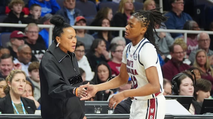 Mar 31, 2024; Albany, NY, USA; South Carolina Gamecocks head coach Dawn Staley slaps hands with