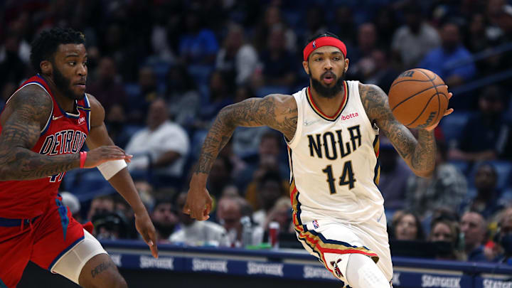 Dec 10, 2021; New Orleans, Louisiana, USA; New Orleans Pelicans forward Brandon Ingram (14) is defended by Detroit Pistons forward Saddiq Bey (41) in the second half at the Smoothie King Center. Mandatory Credit: Chuck Cook-Imagn Images