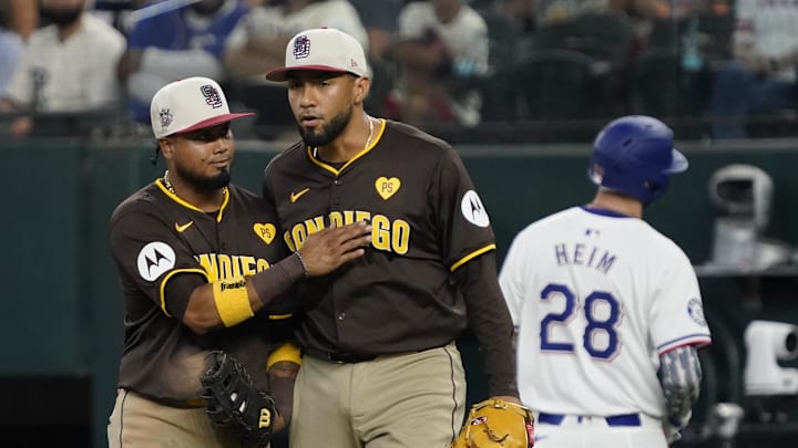 Jul 4, 2024; Arlington, Texas, USA; San Diego Padres second baseman Luis Arraez (4) and pitcher Robert Suarez (75) after recording the final out against the Texas Rangers at Globe Life Field. Mandatory Credit: Raymond Carlin III-Imagn Images Jul 4, 2024; Arlington, Texas, USA; San Diego Padres second baseman Luis Arraez (4) and pitcher Robert Suarez (75) after recording the final out against the Texas Rangers at Globe Life Field. Mandatory Credit: Raymond Carlin III-Imagn Images