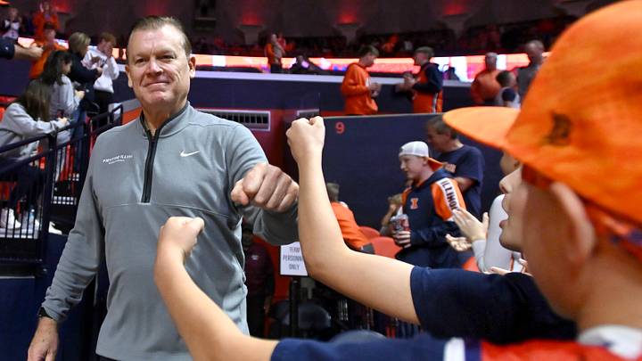 Nov 22, 2025; Champaign, Illinois, USA; Illinois Fighting Illini head coach Brad Underwood greets fans before the opening tip off against the Long Island University Sharks at State Farm Center. Mandatory Credit: Ron Johnson-Imagn Images Nov 22, 2025; Champaign, Illinois, USA; Illinois Fighting Illini head coach Brad Underwood greets fans before the opening tip off against the Long Island University Sharks at State Farm Center. Mandatory Credit: Ron Johnson-Imagn Images