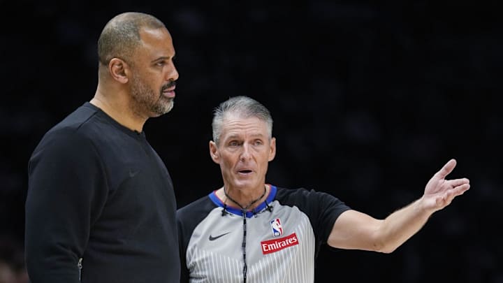 Mar 25, 2026; Minneapolis, Minnesota, USA; Houston Rockets head coach Ime Udoka listens to referee Scott Foster explain his take of plays with the Minnesota Timberwolves in the fourth quarter at Target Center. Mandatory Credit: Bruce Kluckhohn-Imagn Images Mar 25, 2026; Minneapolis, Minnesota, USA; Houston Rockets head coach Ime Udoka listens to referee Scott Foster explain his take of plays with the Minnesota Timberwolves in the fourth quarter at Target Center. Mandatory Credit: Bruce Kluckhohn-Imagn Images