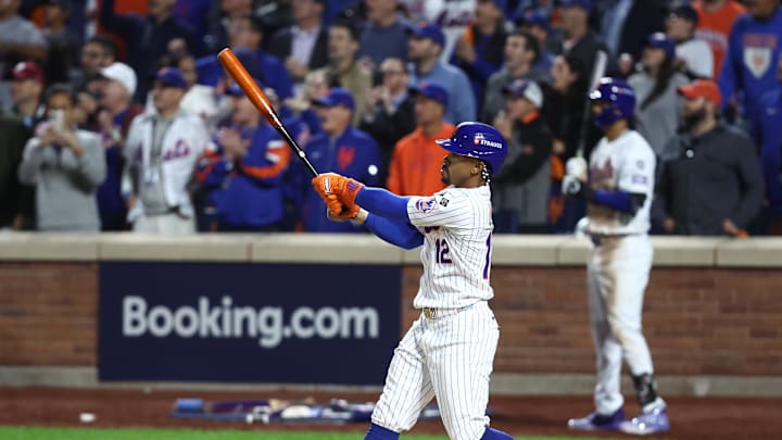 New York Mets shortstop Francisco Lindor (12) hits a grand slam against the Philadelphia Phillies in the sixth inning in game four of the NLDS for the 2024 MLB Playoffs at Citi Field on Oct 9.