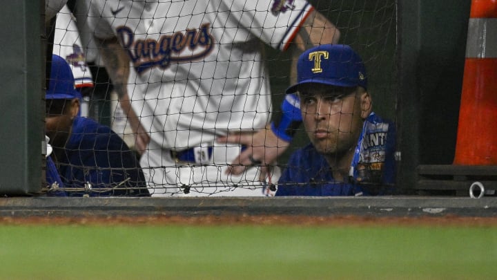Mar 31, 2024; Arlington, Texas, USA; Texas Rangers first baseman Nathaniel Lowe looks on from the