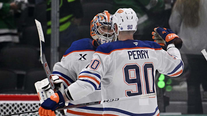 May 23, 2025; Dallas, Texas, USA; Edmonton Oilers right wing Corey Perry (90) and goaltender Stuart Skinner (74)  react after defeating the Dallas Stars in game two of the Western Conference Final of the 2025 Stanley Cup Playoffs 