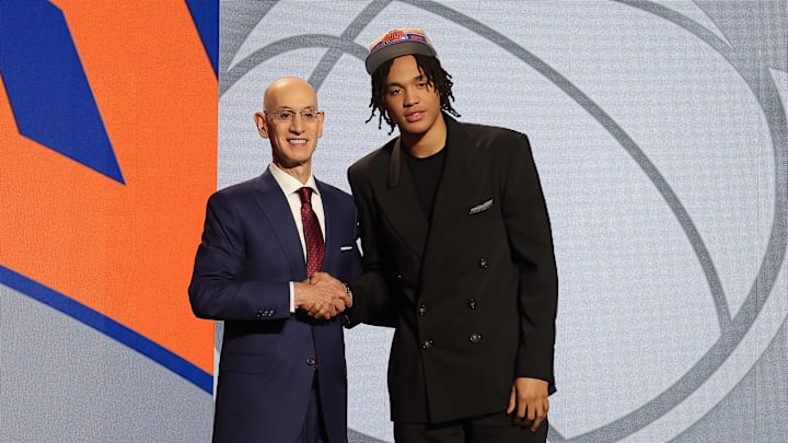 Jun 26, 2024; Brooklyn, NY, USA; Pacome Dadiet poses for photos with NBA commissioner Adam Silver after being selected in the first round by the New York Knicks in the 2024 NBA Draft at Barclays Center. Mandatory Credit: Brad Penner-USA TODAY Sports