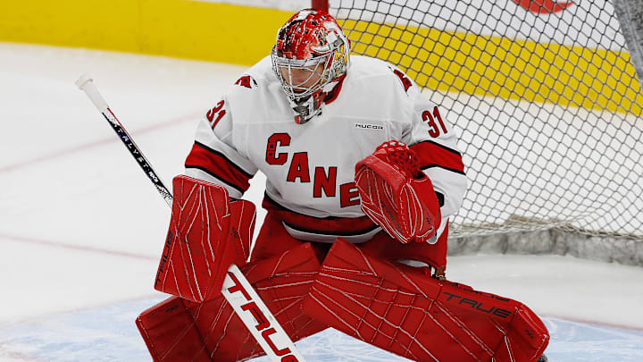 Oct 22, 2024; Edmonton, Alberta, CAN; Carolina Hurricanes goaltender Frederik Andersen (31) makes a save on during warmup against the Edmonton Oilers at Rogers Place. Mandatory Credit: Perry Nelson-Imagn Images