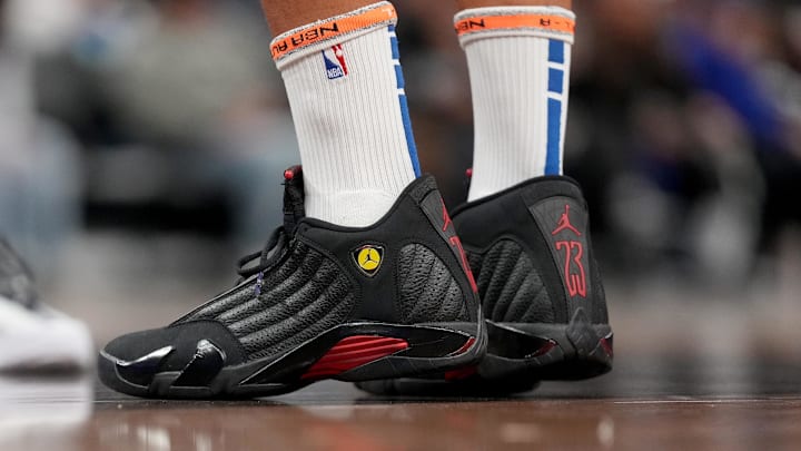 Golden State Warriors guard Stephen Curry wears the Air Jordan 14.