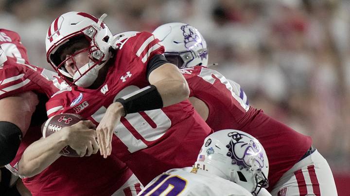 Wisconsin quarterback Ryan Hopkins (10) runs the ball during the fourth quarter of their game Saturday, Sept. 12, 2026 at Camp Randall Stadium in Madison, Wisconsin. Wisconsin beat Western Illinois 36-9.