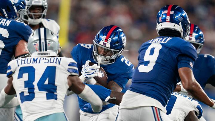 New York Giants running back Tyrone Tracy Jr. (29) runs with the ball before fumbling during a week one opening game between the New York Giants and Dallas Cowboys at Metlife Stadium on Sunday, Sept. 13, 2026, in East Rutherford, NJ. New York Giants running back Tyrone Tracy Jr. (29) runs with the ball before fumbling during a week one opening game between the New York Giants and Dallas Cowboys at Metlife Stadium on Sunday, Sept. 13, 2026, in East Rutherford, NJ.