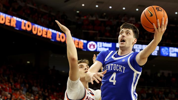 Feb 21, 2026; Auburn, Alabama, USA; Kentucky Wildcats forward Andrija Jelavic (4) gets past Auburn Tigers forward Filip Jovic (38) for a shot during the first half at Neville Arena. Mandatory Credit: John Reed-Imagn Images Feb 21, 2026; Auburn, Alabama, USA; Kentucky Wildcats forward Andrija Jelavic (4) gets past Auburn Tigers forward Filip Jovic (38) for a shot during the first half at Neville Arena. Mandatory Credit: John Reed-Imagn Images