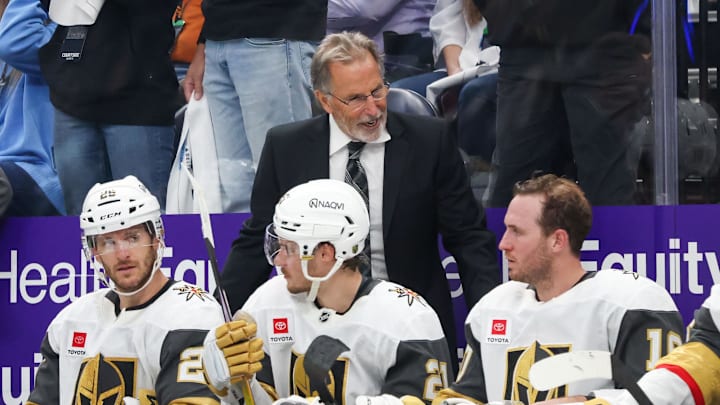 Apr 24, 2026; Salt Lake City, Utah, USA; Vegas Golden Knights head coach John Tortorella speaks to center Nic Dowd (26), center Brett Howden (21) and center Colton Sissons (10) during the third period in game three of the first round of the 2026 Stanley Cup Playoffs against the Utah Mammoth at Delta Center. Mandatory Credit: Rob Gray-Imagn Images