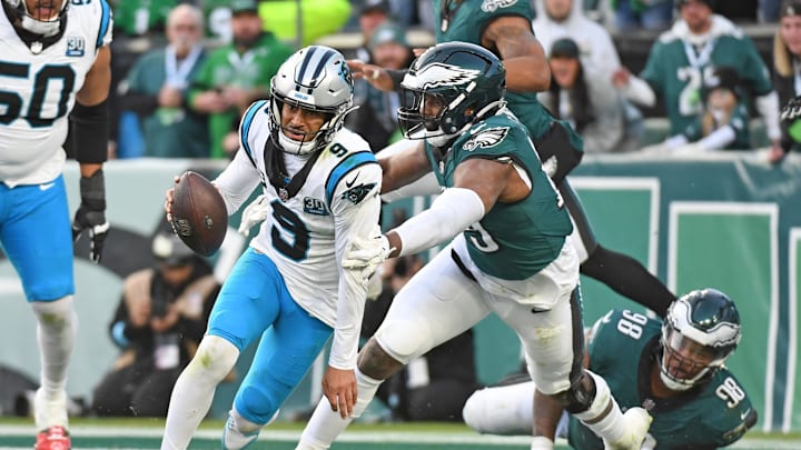 Dec 8, 2024; Philadelphia, Pennsylvania, USA; Carolina Panthers quarterback Bryce Young (9) scrambles out of the end zone under pressure from Philadelphia Eagles linebacker Josh Sweat (19) during the fourth quarter at Lincoln Financial Field. Mandatory Credit: Eric Hartline-Imagn Images Dec 8, 2024; Philadelphia, Pennsylvania, USA; Carolina Panthers quarterback Bryce Young (9) scrambles out of the end zone under pressure from Philadelphia Eagles linebacker Josh Sweat (19) during the fourth quarter at Lincoln Financial Field. Mandatory Credit: Eric Hartline-Imagn Images