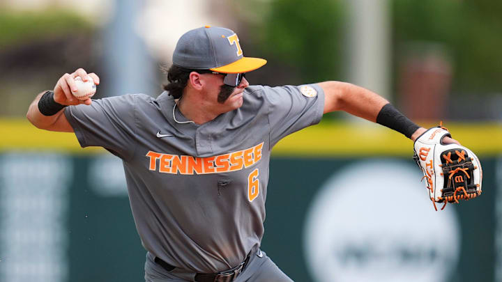 Tennessee's Gavin Kilen (6) throws to first during game one of the NCAA baseball tournament Fayetteville Super Regional between Tennessee and Arkansas held at Baum-Walker Stadium on Saturday, June 7, 2025.