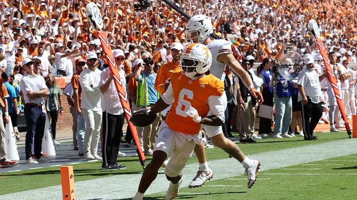 Sep 26, 2026; Knoxville, Tennessee, USA;  Tennessee Volunteers defensive back Qua Moss (6) scores a touchdown against the Texas Longhorns during the second half at Neyland Stadium.  Mandatory Credit: Randy Sartin-Imagn Images