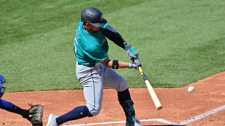 Mar 8, 2024; Mesa, Arizona, USA;  Seattle Mariners center fielder Jonatan Clase (85) hits an RBI