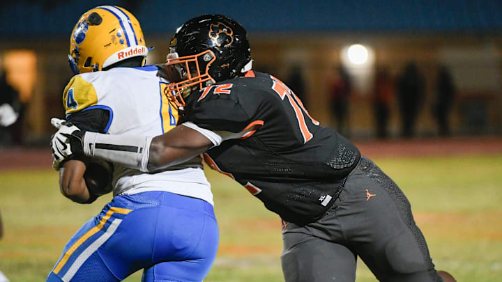 Chavez “Sandman” Thompson of Cocoa tackles Newberry Panthers ballcarrier Logan McCloud during the FHSAA Class 2A Region 2 finals, Friday, November 29, 2024. Craig Bailey/FLORIDA TODAY via USA TODAY NETWORK Chavez “Sandman” Thompson of Cocoa tackles Newberry Panthers ballcarrier Logan McCloud during the FHSAA Class 2A Region 2 finals, Friday, November 29, 2024. Craig Bailey/FLORIDA TODAY via USA TODAY NETWORK