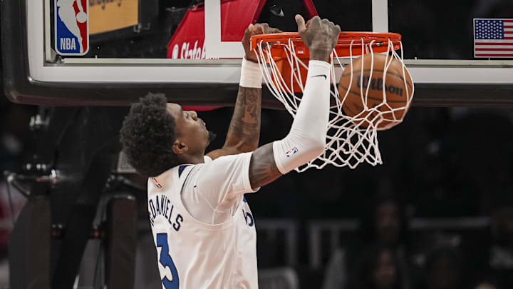 Dec 31, 2025; Atlanta, Georgia, USA; Minnesota Timberwolves forward Jaden McDaniels (3) dunks against the Atlanta Hawks during the first half at State Farm Arena. Mandatory Credit: Dale Zanine-Imagn Images