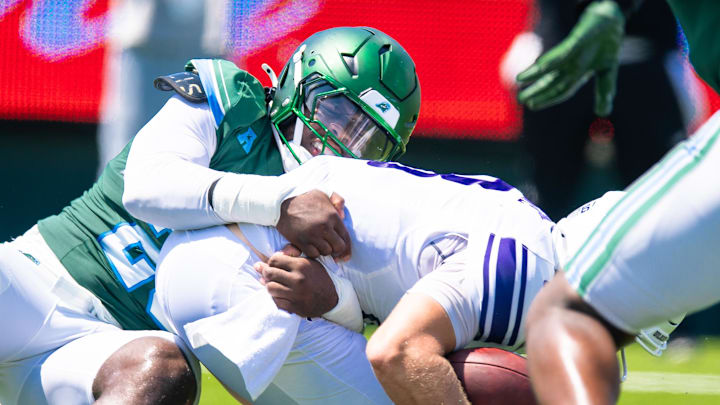 Aug 30, 2025; New Orleans, Louisiana, USA; Northwestern Wildcats quarterback Preston Stone (8) has to scramble out the pocket but is sacked by Tulane Green Wave defensive lineman Santana Hopper (29) during the second half at Yulman Stadium. Mandatory Credit: Stephen Lew-Imagn Images Aug 30, 2025; New Orleans, Louisiana, USA; Northwestern Wildcats quarterback Preston Stone (8) has to scramble out the pocket but is sacked by Tulane Green Wave defensive lineman Santana Hopper (29) during the second half at Yulman Stadium. Mandatory Credit: Stephen Lew-Imagn Images
