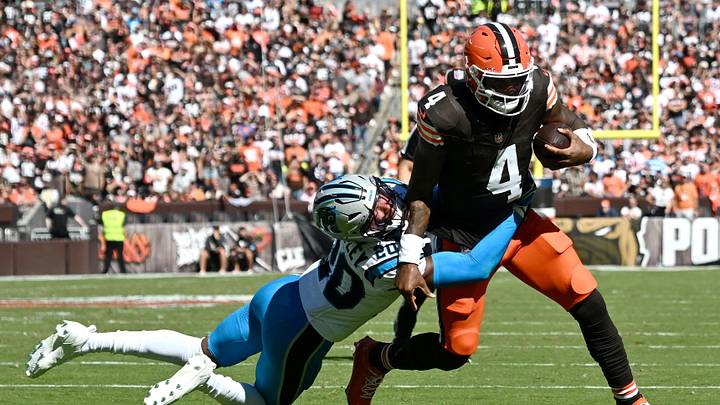 Sep 27, 2026; Cleveland, Ohio, USA;  Carolina Panthers safety Zakee Wheatley (20) tackles Cleveland Browns quarterback Deshaun Watson (4) during the second quarter at Huntington Bank Field.  Mandatory Credit: Ken Blaze-Imagn Images