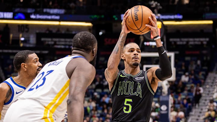 Feb 24, 2026; New Orleans, Louisiana, USA; New Orleans Pelicans guard Dejounte Murray (5) dribbles against Golden State Warriors forward Draymond Green (23) during the first half at Smoothie King Center. Mandatory Credit: Stephen Lew-Imagn Images Feb 24, 2026; New Orleans, Louisiana, USA; New Orleans Pelicans guard Dejounte Murray (5) dribbles against Golden State Warriors forward Draymond Green (23) during the first half at Smoothie King Center. Mandatory Credit: Stephen Lew-Imagn Images