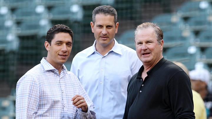 Texas Rangers general manager Jon Daniels (left) and assistant general manager Thad Levine (middle) and senior executive vice president Jim Sundberg talk before the game against the Mexico City Red Devils on March 28, 2013.